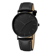 Load image into Gallery viewer, Black vegan leather luxury men's watch with minimalist design and stitched strap, featuring a sleek black dial.