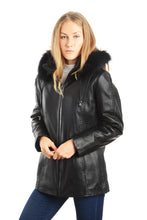 Load image into Gallery viewer, Woman wearing a black leather jacket with fur hood on a white background