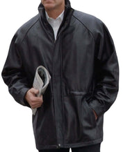 Load image into Gallery viewer, REED 34'' Raglan Car Coat in Imported Lamb with Zip-Out Lining, classic black men's jacket, holding a newspaper, soft touch leather.