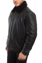 Cargar imagen en el visor de la galería, REED Men's lamb touch faux leather jacket with detachable fur collar, classic style, black, model wearing product, side view