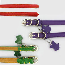 Cargar imagen en el visor de la galería, Colorful genuine leather dog collars with metal buckles, available in red, purple, and green, showcasing luxurious and durable design.