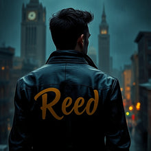 Load image into Gallery viewer, Person wearing a leather jacket with 'Reed' on the back, standing in front of a cityscape at night.