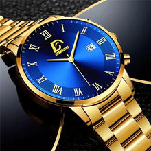 Load image into Gallery viewer, Gold minimalist men's watch with blue dial and Roman numerals on black background.