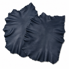 Cargar imagen en el visor de la galería, 2 Navy sheepskin hides over a white background