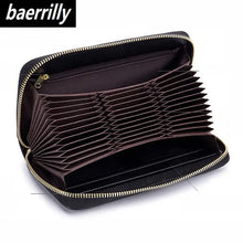 Load image into Gallery viewer, Black leather travel purse with multiple compartments, perfect for organizing essentials, featuring a zip closure by Baerrilly.