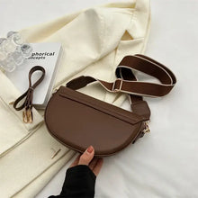 Load image into Gallery viewer, Brown leather shoulder bag with chain strap on white fabric, showcasing elegant and compact design for any occasion.