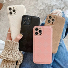 Cargar imagen en el visor de la galería, Four Retro Leather Cases made of vegan PU leather in white, black, pink, and tan displayed on a textured surface.