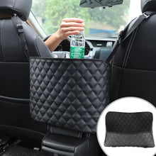 Load image into Gallery viewer, Luxury vegan leather car handbag holder organizer between seats, maximizing storage space in vehicle interior.