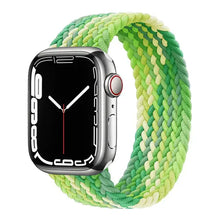 Load image into Gallery viewer, Green and yellow braided nylon strap for Apple Watch, shown on a stainless steel watch face.