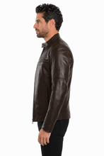 Load image into Gallery viewer, A man shown in profile wearing a dark brown leather jacket and black pants against a plain white studio background.
