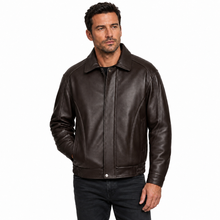 Load image into Gallery viewer, A man wearing a black REED genuine cow leather bomber jacket with white background