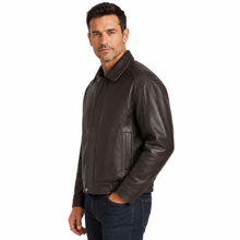 Load image into Gallery viewer, A man wearing a black REED genuine leather bomber jacket