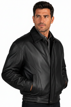 Load image into Gallery viewer, A man wearing a black leather jacket over a dark gray button-up shirt, photographed against a solid white background.