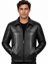 Charger l'image dans la galerie, A man wearing a black leather jacket with a front zipper, collar, and side pockets, paired with a black shirt and black jeans, against a plain white background.