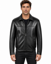 Charger l'image dans la galerie, A man wearing a black leather jacket with a front zipper, stand collar, and zippered hand pockets, photographed against a plain white background.
