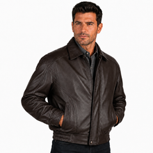 Load image into Gallery viewer, A man wearing a dark brown leather jacket over a dark gray button-up shirt, photographed against a plain white studio background.