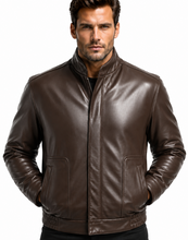 Load image into Gallery viewer, A man wearing a dark brown leather jacket with a stand-up collar, front zipper, and two front patch pockets, photographed against a plain white background.