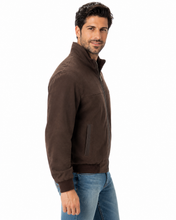 Load image into Gallery viewer, A man wearing a dark brown quarter-zip fleece jacket and blue jeans, shown in a side profile against a plain white background.