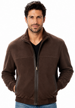 Load image into Gallery viewer, A man wearing a dark brown zip-up fleece jacket over a black shirt and blue jeans, photographed against a plain white background.