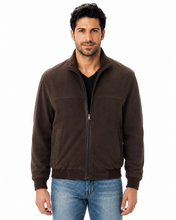 Load image into Gallery viewer, A man wearing a dark brown zip-up suede jacket over a black t-shirt and blue jeans, photographed against a solid white background.
