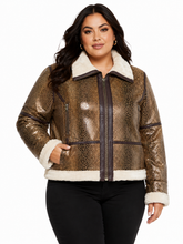 Cargar imagen en el visor de la galería, A woman modeling a cropped zip-front jacket with a metallic bronze reptile pattern, cream shearling-style collar and cuffs, and dark brown trim, paired with black pants against a plain white studio background.