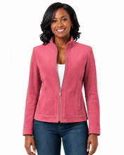 Cargar imagen en el visor de la galería, A woman modeling a pink zip-up jacket with a stand collar, worn over a white top and blue jeans, against a plain white background.