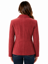 Cargar imagen en el visor de la galería, A woman viewed from the back wearing a muted red suede blazer and dark blue jeans against a plain white background.