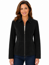Cargar imagen en el visor de la galería, A woman wearing a black zip-front jacket with a collar and long sleeves, paired with dark blue jeans, shown against a plain white background.