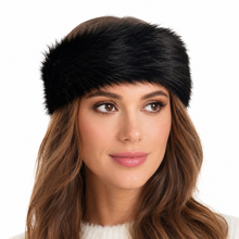 Charger l'image dans la galerie, A woman wearing a thick black faux fur winter hat or headband, shown from the chest up against a plain white background.