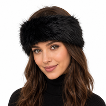 Charger l'image dans la galerie, A woman wearing a wide, fluffy black faux fur headband against a solid white background.
