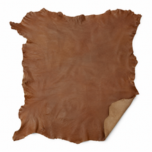 Cargar imagen en el visor de la galería, Brown Reed sheep skin leather hide on a white background