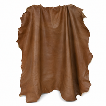 Cargar imagen en el visor de la galería, Brown Reed sheepskin leather hide on a white background