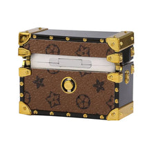 Cargar imagen en el visor de la galería, Luxe brown leather AirPods Pro case with intricate strap and gold-tone accents, protective stylish design, elegant everyday accessory
