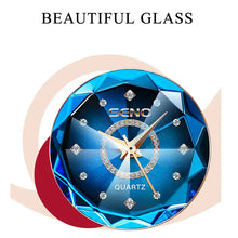 Cargar imagen en el visor de la galería, Stunning quartz watch face with blue geometric design and sparkling dial, showcasing elegance and style with 'Beautiful Glass' text above.
