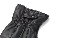 Load image into Gallery viewer, Close-up of black leather glove with button detail, showcasing soft texture and craftsmanship, touchscreen compatible for winter use.