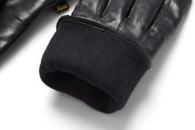 Load image into Gallery viewer, Black leather women's driving gloves with warm lining and snug fit, perfect for cold weather and everyday use.