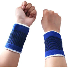 Load image into Gallery viewer, Pair of blue adjustable wrist support braces for sports and injury protection