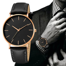 Load image into Gallery viewer, Black minimalist men's luxury watch with vegan leather strap, offering sophistication and style. Ideal accessory for a refined look.