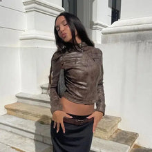 Charger l'image dans la galerie, Woman wearing vintage zip-up faux leather jacket, displaying chic style outdoors