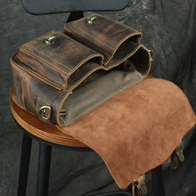 Load image into Gallery viewer, The Faust Leather Camera Bag | Crossbody Vintage Camera Messenger Bag displayed open showing compartments on a wooden stool