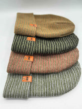 Load image into Gallery viewer, HAAKWEAR Traditional Contrast Cuffed Beanie Hat - Brown / Green, Made in USA, shown stacked in four color variations with leather logos