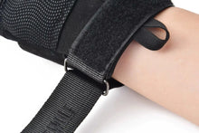Load image into Gallery viewer, Close-up of black tactical glove with adjustable strap, highlighting anti-slip technology and superior grip for workouts and outdoor activities.