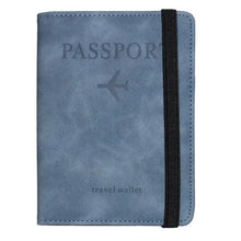 Load image into Gallery viewer, Leather RFID-blocking passport holder and travel wallet in blue with black strap for secure travel protection.