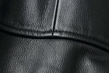 Load image into Gallery viewer, Close-up of premium black leather texture on REED aviator bomber jacket