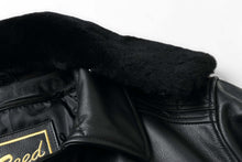 Load image into Gallery viewer, Close-up of the REED Men's Premium Leather Aviator Bomber Jacket collar, showing soft imported leather and luxurious interior lining.