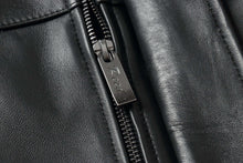 Load image into Gallery viewer, Close-up of REED 34'' Raglan Car Coat in Imported Lamb leather with zip-out lining and sleek designer label detailing.