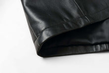 Load image into Gallery viewer, Close-up of REED's 34'' Raglan Men's Car Coat in Imported Lamb, showcasing luxurious leather and zip-out lining detail.