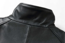 Load image into Gallery viewer, Close-up of black leather collar on REED 34'' Raglan Car Coat, imported lamb, zip-out lining, classic style.