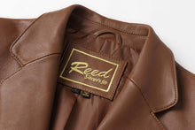 Load image into Gallery viewer, REED Men's Premium Lambskin Leather Blazer close-up showing logo and luxurious texture