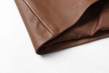 Load image into Gallery viewer, Close-up of REED Men's Premium Lambskin Leather Blazer showcasing soft-touch brown leather and lining.